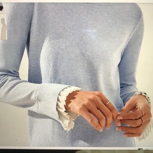 Pleated bell cuff sweater
